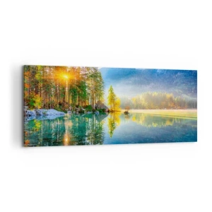 Obraz na płótnie - Jezioro otoczone górami i lasem w promieniach słońca - 120x50cm - Majestat i słodycz - Nowoczesna dekoracja ścienna do salonu i sypialni ARTTOR