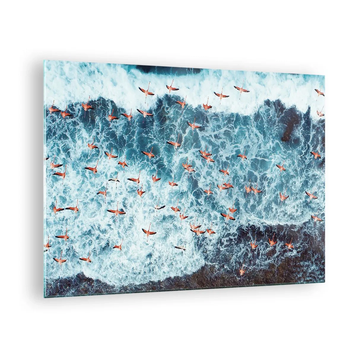 Obraz na szkle - Różowe flamingi nad wzburzonymi falami oceanu - 70x50cm - Nadmorska parada - Nowoczesna dekoracja ścienna do salonu i sypialni ARTTOR