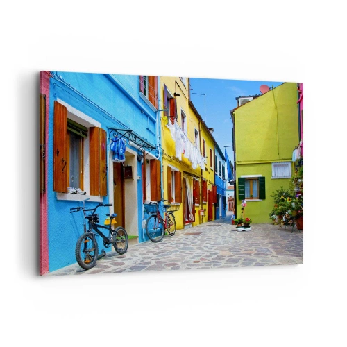 Obraz na płótnie - Kolorowa uliczka z rowerami wśród pastelowych budynków - 100x70cm - Pastelowy, słodki zaułek - Nowoczesna dekoracja ścienna do salonu, kuchni i sypialni ARTTOR