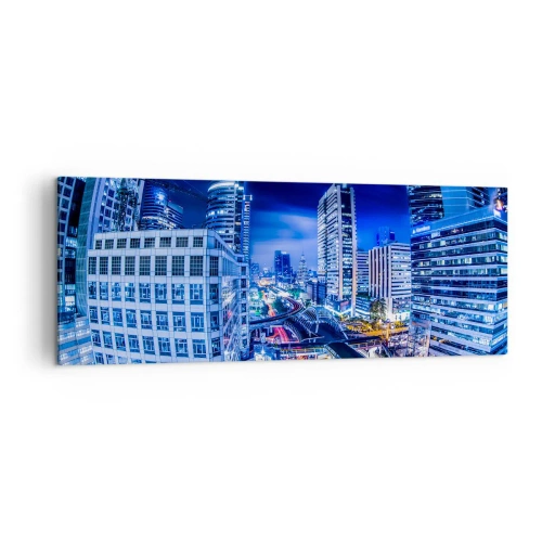 Obraz na płótnie - Nocna panorama miasta z drapaczami chmur i światłami ulic - 140x50cm - Rytmy nocnego miasta - Nowoczesna dekoracja ścienna do salonu i sypialni ARTTOR