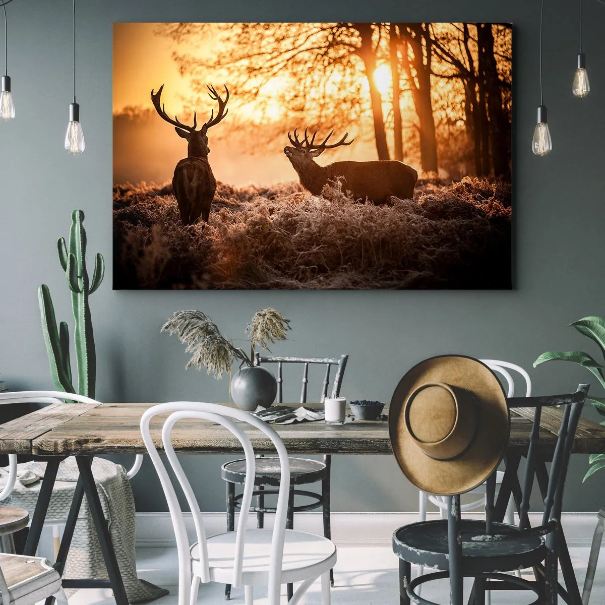 Obraz na płótnie - Dwa jelenie o zachodzie słońca w zimowym krajobrazie - 70x50cm - Marzenie myśliwego - Nowoczesna dekoracja ścienna do salonu i sypialni ARTTOR