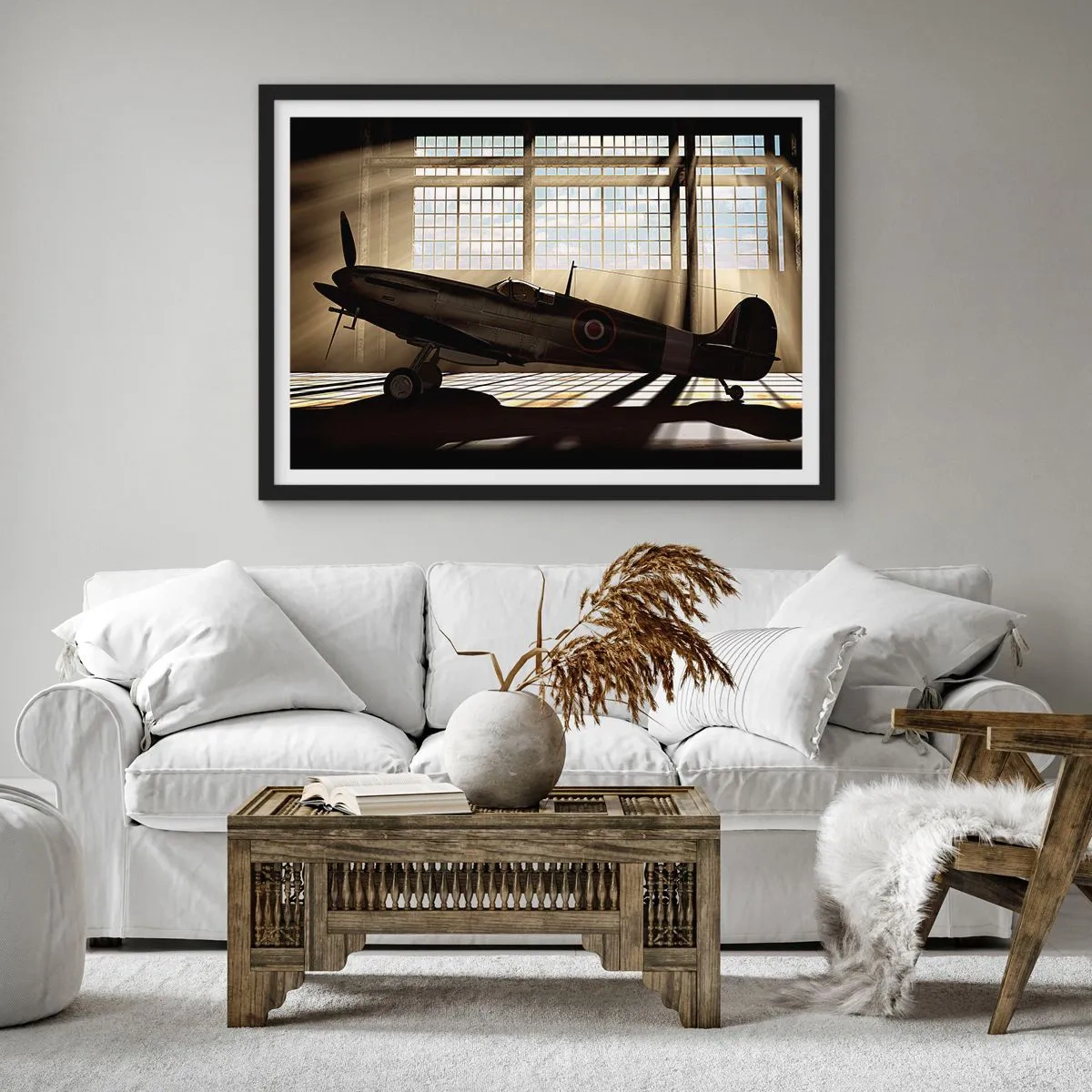 Plakat w czarnej ramie - Historyczny samolot w hangarze oświetlonym promieniami słońca - 100x70cm - Odpoczynek wojownika - Nowoczesna dekoracja ścienna do salonu i sypialni ARTTOR