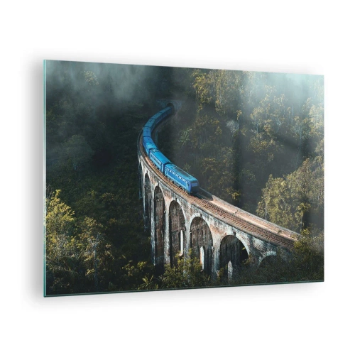 Obraz na szkle - Niebieski pociąg jadący po kamiennym wiadukcie wśród lasu - 70x50cm - Pociąg do natury - Nowoczesna dekoracja ścienna do salonu i sypialni ARTTOR