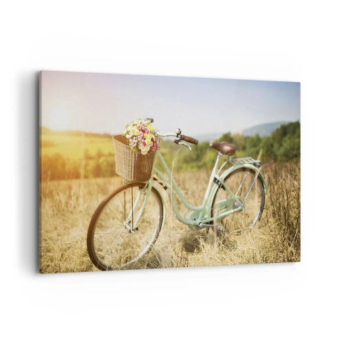 Obraz na płótnie - Retro rower z koszykiem pełnym kwiatów na tle łąki - 120x80cm - Zostanę tu chwilę - Nowoczesna dekoracja ścienna do salonu, kuchni i sypialni ARTTOR