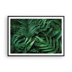 Plakat w czarnej ramie - Zielone liście tropikalne w gęstej i naturalnej kompozycji - 100x70cm - Utulone w zieleni - Nowoczesna dekoracja ścienna do salonu i sypialni ARTTOR