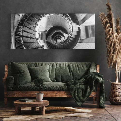 Obraz na płótnie - Czarno-biała fotografia spiralnych schodów z perspektywą z góry - 160x50cm - Wyżej i wyżej - Nowoczesna dekoracja ścienna do salonu i sypialni ARTTOR