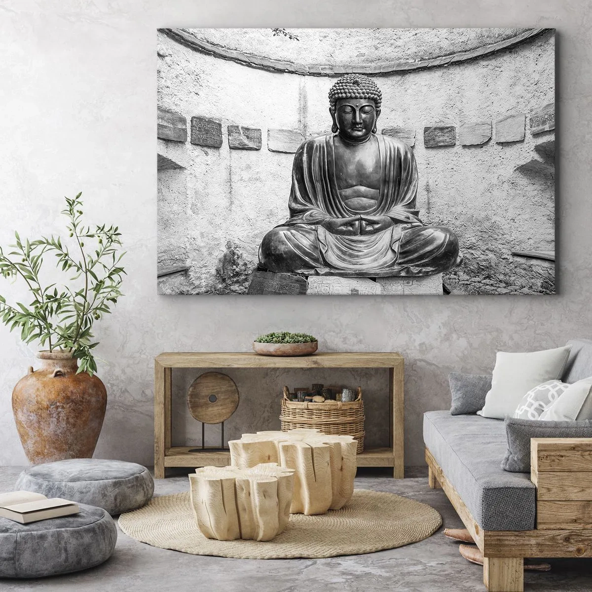 Obraz na płótnie - Czarno-biały posąg Buddy w medytacyjnej pozie - 70x50cm - U źródeł spokoju - Nowoczesna dekoracja ścienna do salonu i sypialni ARTTOR
