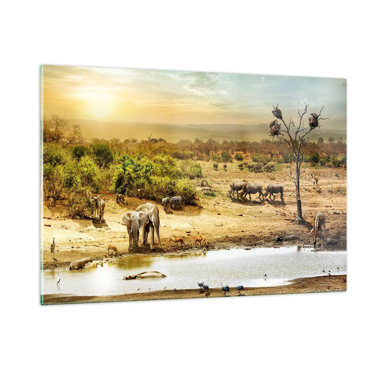 Obraz na szkle - Słonie i zwierzęta przy wodopoju na tle afrykańskiego krajobrazu - 120x80cm - "Z Edenu zaś wypływała rzeka…" - Nowoczesna dekoracja ścienna do salonu, kuchni i sypialni ARTTOR