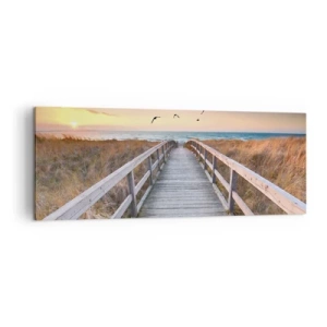 Obraz na płótnie - Drewniany pomost prowadzący na plażę o zachodzie słońca - 140x50cm - Przestrzeń wzlotów - Nowoczesna dekoracja ścienna do salonu i sypialni ARTTOR