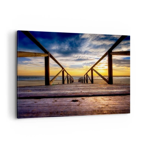 Obraz na płótnie - Drewniany pomost prowadzący na plażę o zachodzie słońca - 100x70cm - Prosto na cichą plażę o zachodzie słońca - Nowoczesna dekoracja ścienna do salonu, kuchni i sypialni ARTTOR