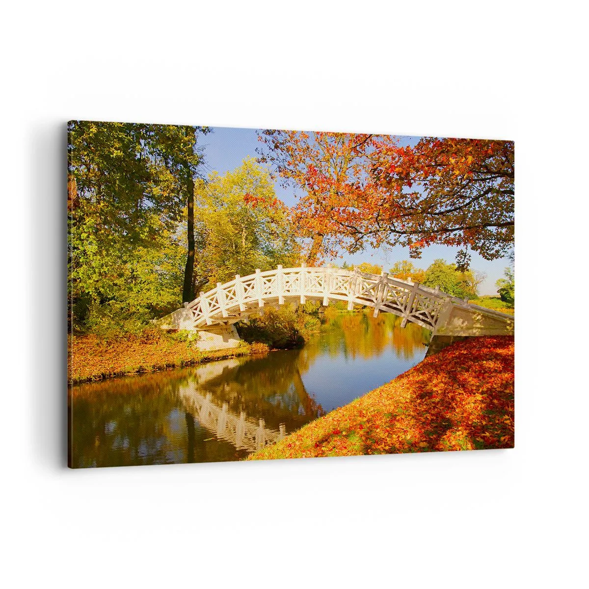 Obraz na płótnie - Mostek w parku otoczony jesiennymi liśćmi nad spokojną wodą - 100x70cm - Na białym mostku westchnień - Nowoczesna dekoracja ścienna do salonu, kuchni i sypialni ARTTOR