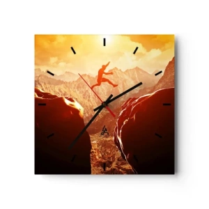 Zegar ścienny - Postać skacząca między skałami na tle gór - 30x30cm - Przekraczając granice - Nowoczesna dekoracja ścienna do salonu i sypialni ARTTOR