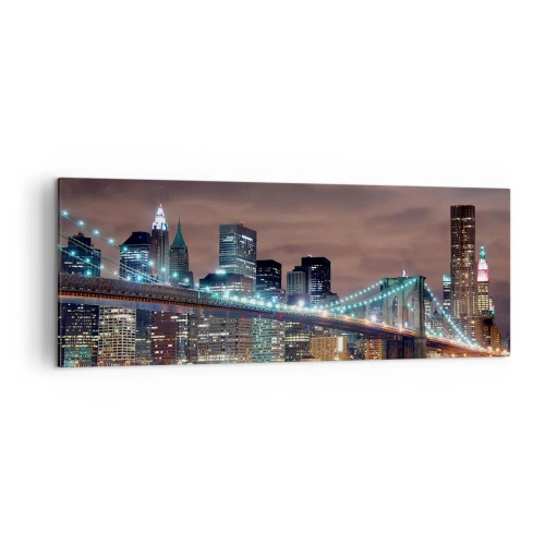 Obraz na płótnie - Most podświetlony nocą na tle nowoczesnej panoramy miasta - 140x50cm - Światła wielkiego miasta - Nowoczesna dekoracja ścienna do salonu i sypialni ARTTOR