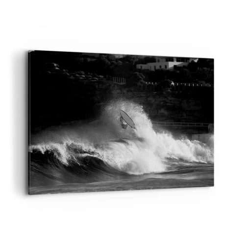 Obraz na płótnie - Surfer na fali w monochromatycznym ujęciu - 100x70cm - Wyzwanie przyjęte! - Nowoczesna dekoracja ścienna do salonu, kuchni i sypialni ARTTOR