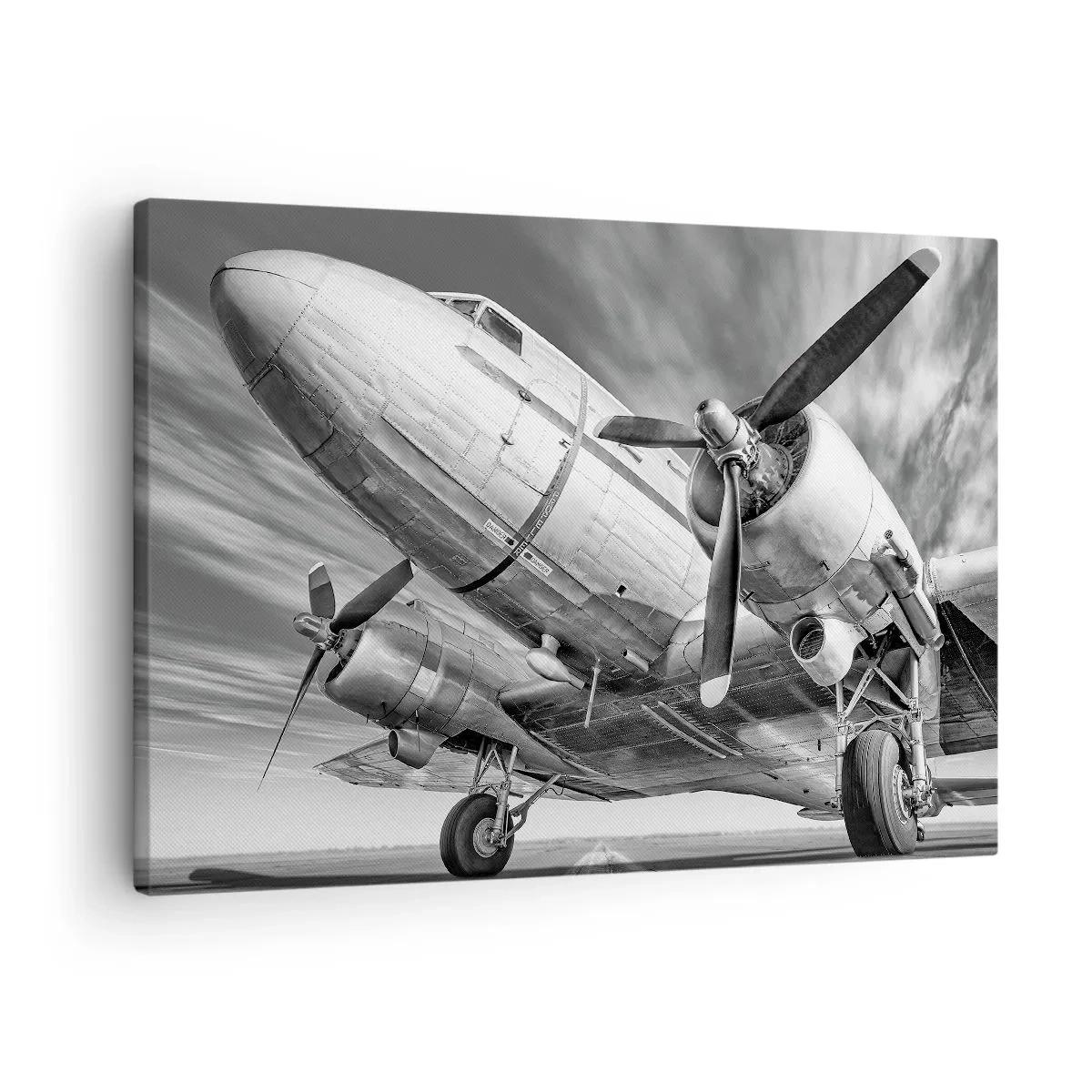Obraz na płótnie - Czarno-biały wizerunek klasycznego samolotu z widocznymi szczegółami konstrukcji - 70x50cm - Zawsze gotowy do lotu - Nowoczesna dekoracja ścienna do salonu i sypialni ARTTOR