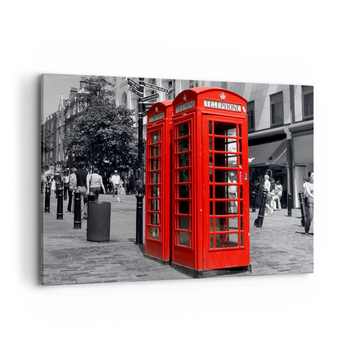 Obraz na płótnie - Czerwone budki telefoniczne na tle czarno-białej miejskiej scenerii. - 100x70cm - Czerwone budki telefoniczne - Nowoczesna dekoracja ścienna do salonu, kuchni i sypialni ARTTOR