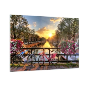 Obraz na szkle - Zachód słońca nad kanałem z rowerami w tle - 100x70cm - Wiosenny poranek w Amsterdamie - Nowoczesna dekoracja ścienna do salonu, kuchni i sypialni ARTTOR