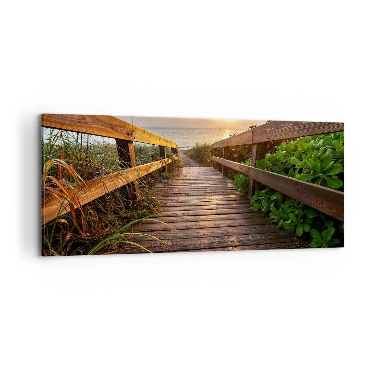 Obraz na płótnie - Drewniany pomost prowadzący na plażę o zachodzie słońca - 120x50cm - I wprost nad brzeg - Nowoczesna dekoracja ścienna do salonu i sypialni ARTTOR
