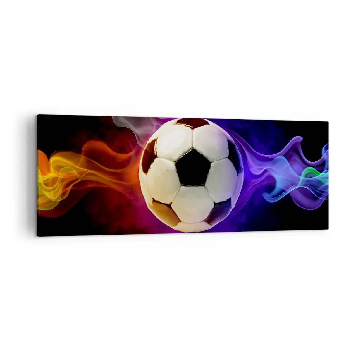 Obraz na płótnie - Piłka nożna otoczona kolorowymi efektami dymu na ciemnym tle - 140x50cm - Magiczna moc gry - Nowoczesna dekoracja ścienna do salonu i sypialni ARTTOR