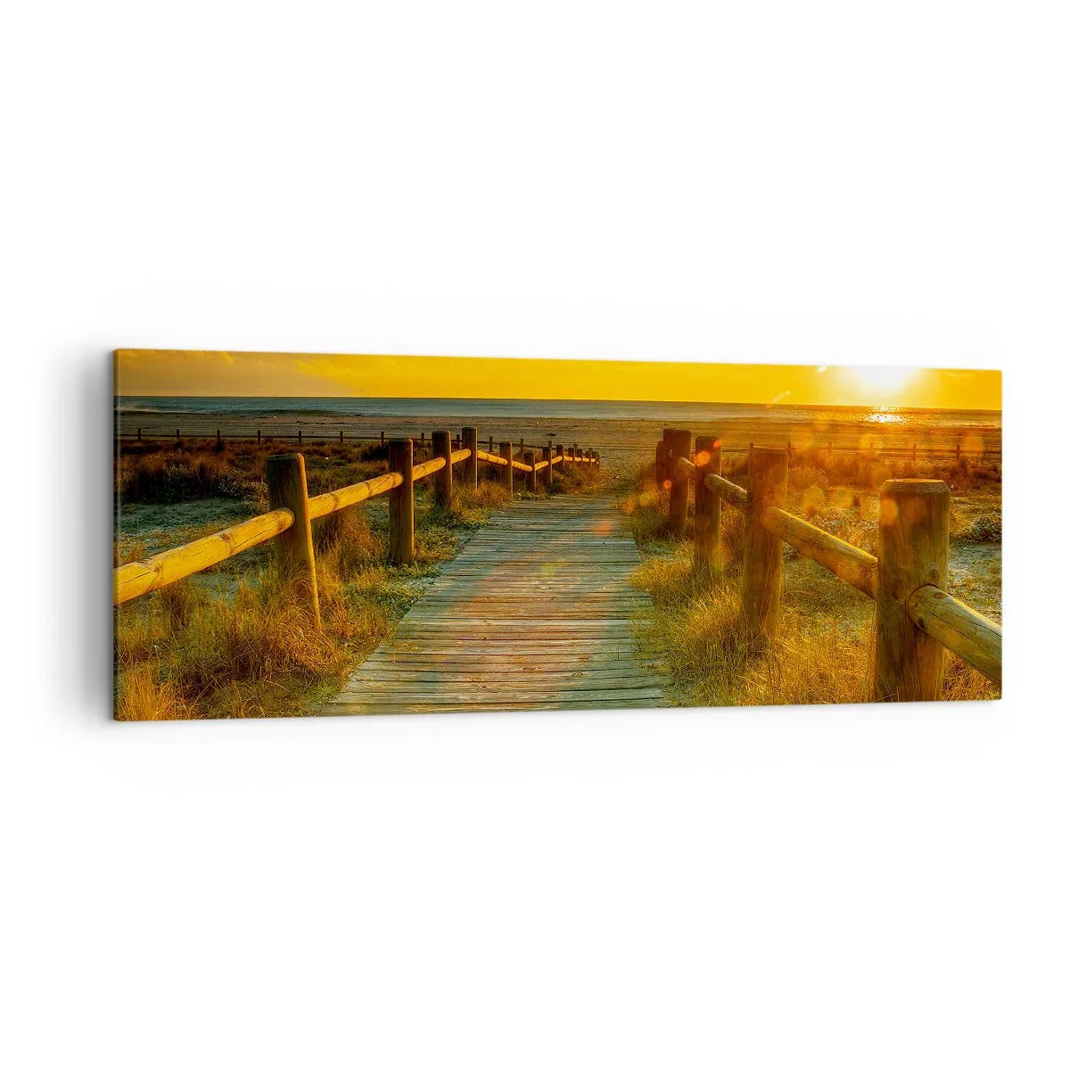 Obraz na płótnie - Drewniana ścieżka prowadząca na plażę w blasku zachodzącego słońca - 140x50cm - Skąpane w starym złocie - Nowoczesna dekoracja ścienna do salonu i sypialni ARTTOR