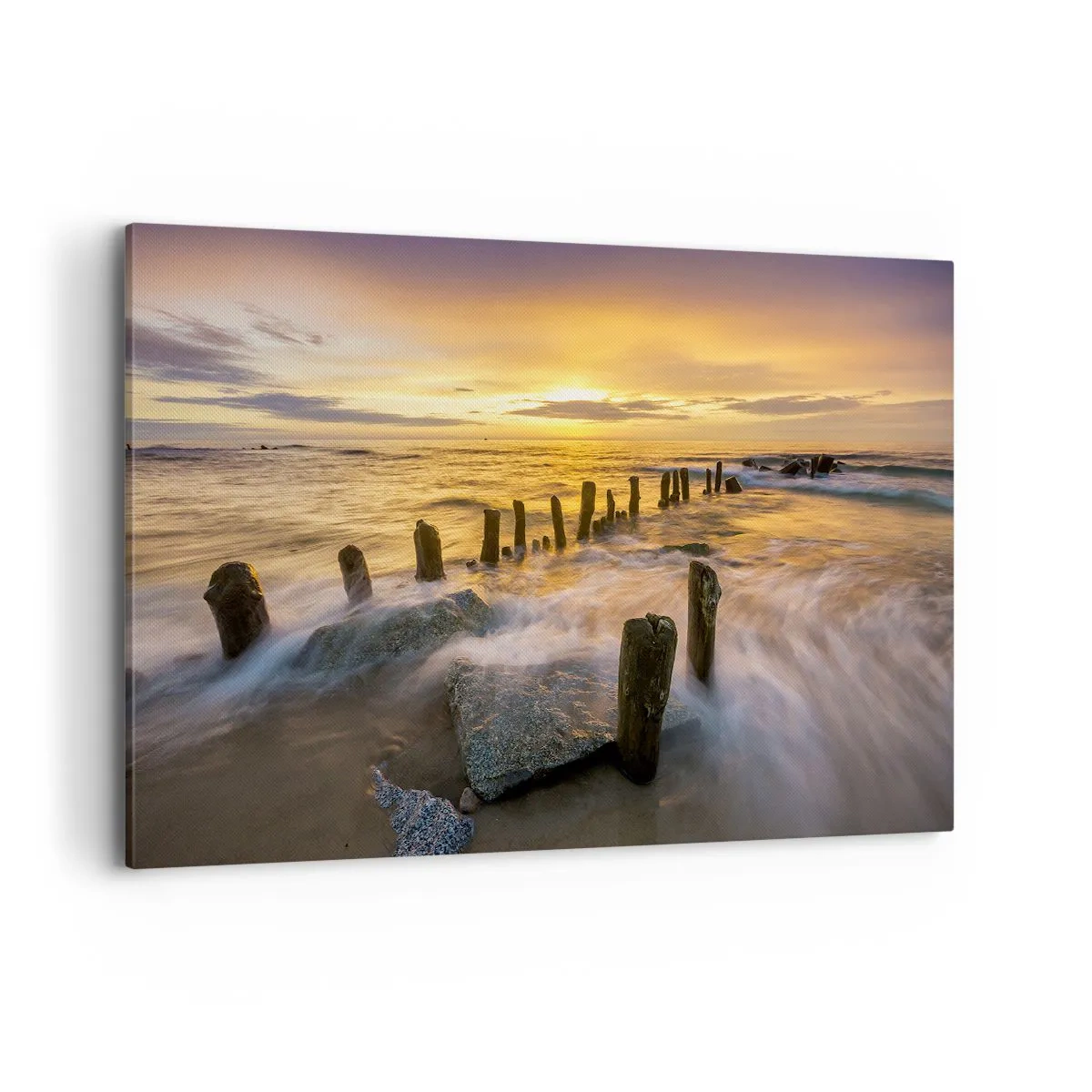 Obraz na płótnie - Zachód słońca nad morzem z pozostałościami starego molo - 100x70cm - Surowe piękno Bałtyku - Nowoczesna dekoracja ścienna do salonu, kuchni i sypialni ARTTOR