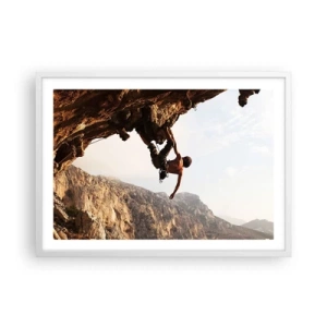 Plakat w białej ramie - Świat skurczony w garści na obrywie głazu - 70x50 cm