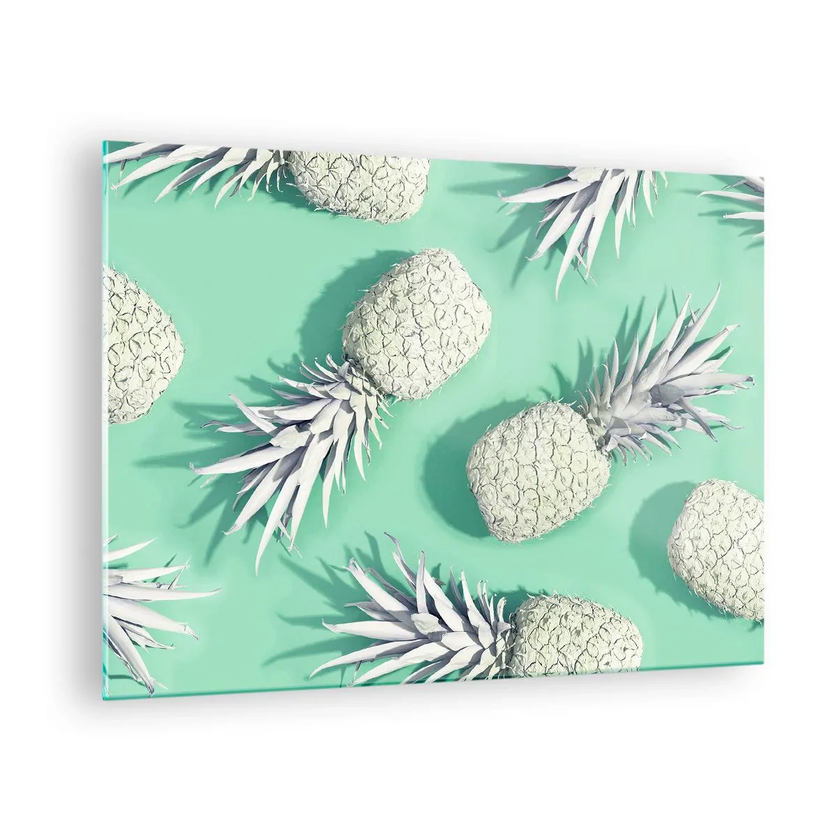 Obraz na szkle - Białe ananasy na miętowym tle w artystycznej kompozycji - 70x50cm - świetnie komponują się z miętą - Nowoczesna dekoracja ścienna do salonu i sypialni ARTTOR