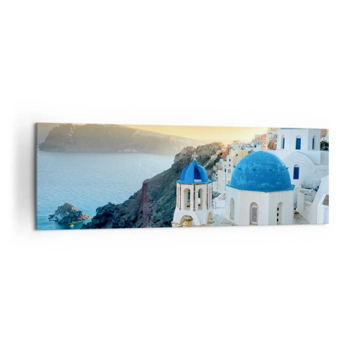 Obraz na płótnie - Widok na Santorini z białymi budynkami i błękitnym morzem - 160x50cm - Santorini - przytulone do skał - Nowoczesna dekoracja ścienna do salonu i sypialni ARTTOR