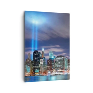 Obraz na płótnie - Panorama Nowego Jorku z Tribute in Light nocą - 50x70cm - Światłem dosięgnąć nieba - Nowoczesna dekoracja ścienna do salonu, kuchni i sypialni ARTTOR