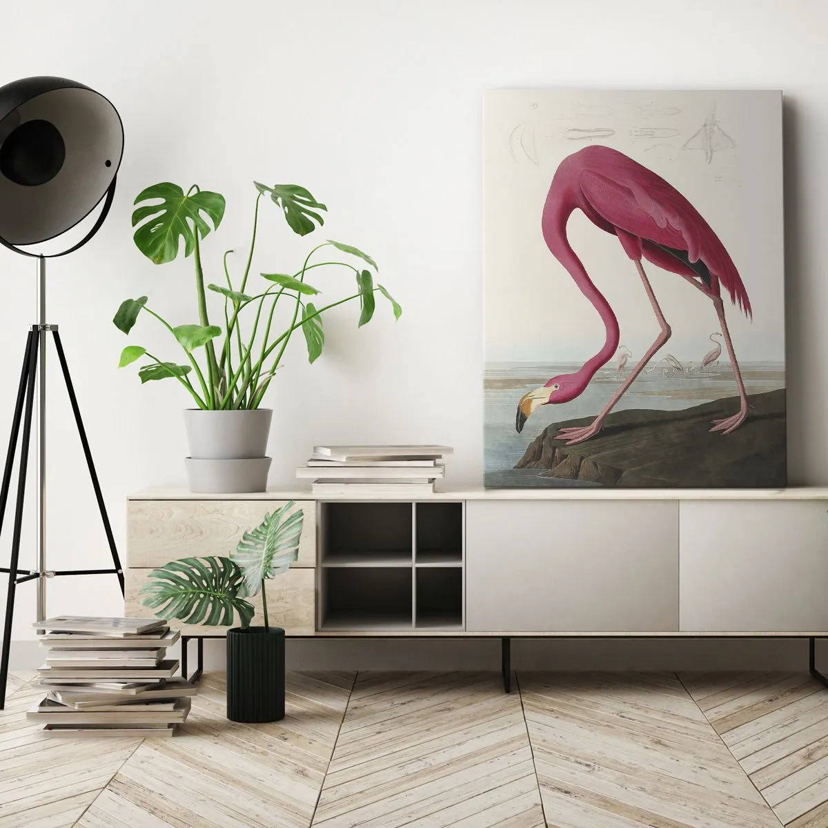 Obraz na płótnie - Różowy flaming stojący na skale z pochyloną głową - 50x70cm - Zadziwiające stworzenie - Nowoczesna dekoracja ścienna do salonu, kuchni i sypialni ARTTOR