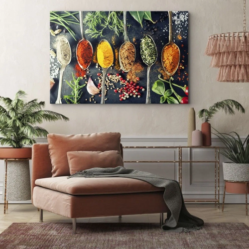 Obraz na płótnie - Kulinarna magia - Kolorowe przyprawy na łyżkach z ziołami w tle - 70x50cm