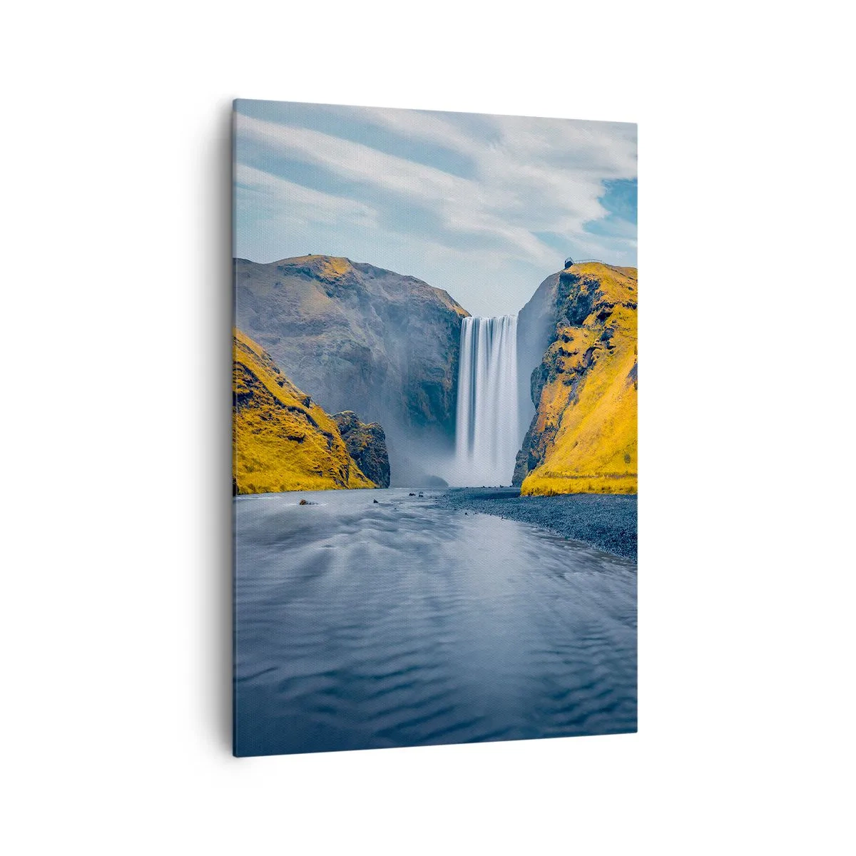 Obraz na płótnie - Wodospad otoczony żółtymi wzgórzami z jeziorem na pierwszym planie - 70x100cm - Wieczne trwanie, wieczny ruch - Nowoczesna dekoracja ścienna do salonu i sypialni ARTTOR