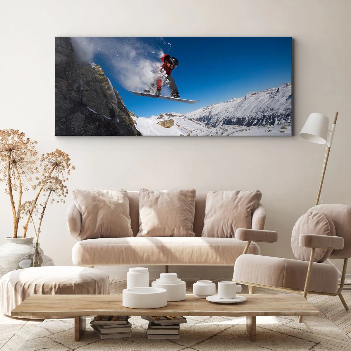 Obraz na płótnie - Snowboardzista skaczący ze skały na tle górskiego krajobrazu - 140x50cm - I stałeś się częścią przestrzeni - Nowoczesna dekoracja ścienna do salonu i sypialni ARTTOR