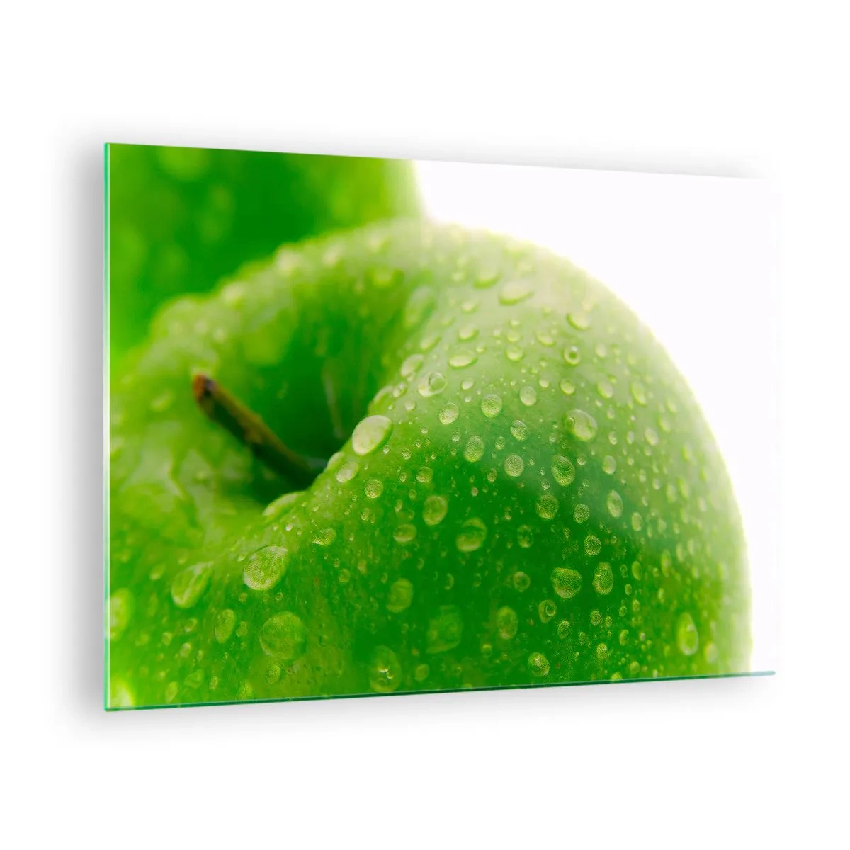 Obraz na szkle - Zielone jabłko pokryte kroplami wody - 70x50cm - Zielona chłodna świeżość - Nowoczesna dekoracja ścienna do salonu i sypialni ARTTOR