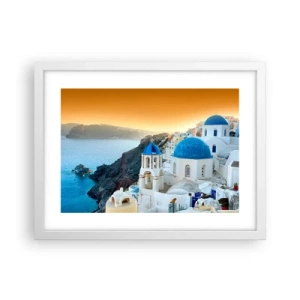 Plakat w białej ramie - Santorini - przytulone do skał - 40x30 cm
