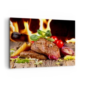 Obraz na płótnie - Grillowany stek z dodatkami na tle płomieni - 100x70cm - Wyczarowane żarem - Nowoczesna dekoracja ścienna do salonu, kuchni i sypialni ARTTOR