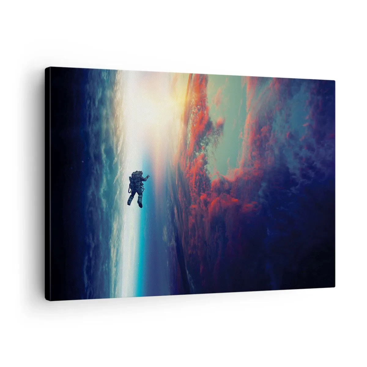 Obraz na płótnie - Astronauta unoszący się w kosmosie nad kolorową Ziemią - 70x50cm - Mierzyć się ze wszechświatem - Nowoczesna dekoracja ścienna do salonu i sypialni ARTTOR