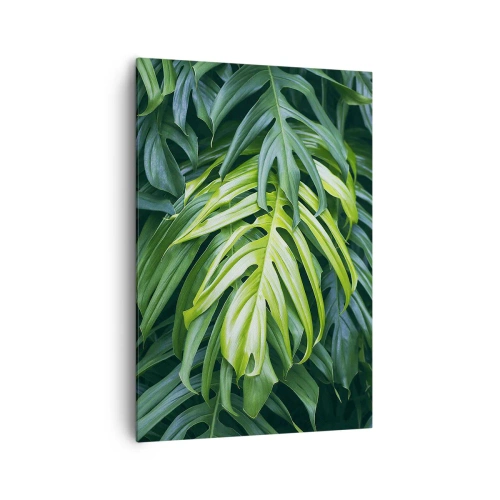 Obraz na płótnie - Zielone liście w gęstym tropikalnym układzie - 70x100cm - Zanurzyć się w świeżości - Nowoczesna dekoracja ścienna do salonu i sypialni ARTTOR