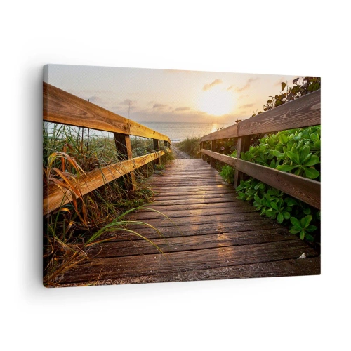 Obraz na płótnie - Drewniany pomost prowadzący na plażę o zachodzie słońca - 70x50cm - I wprost nad brzeg - Nowoczesna dekoracja ścienna do salonu i sypialni ARTTOR