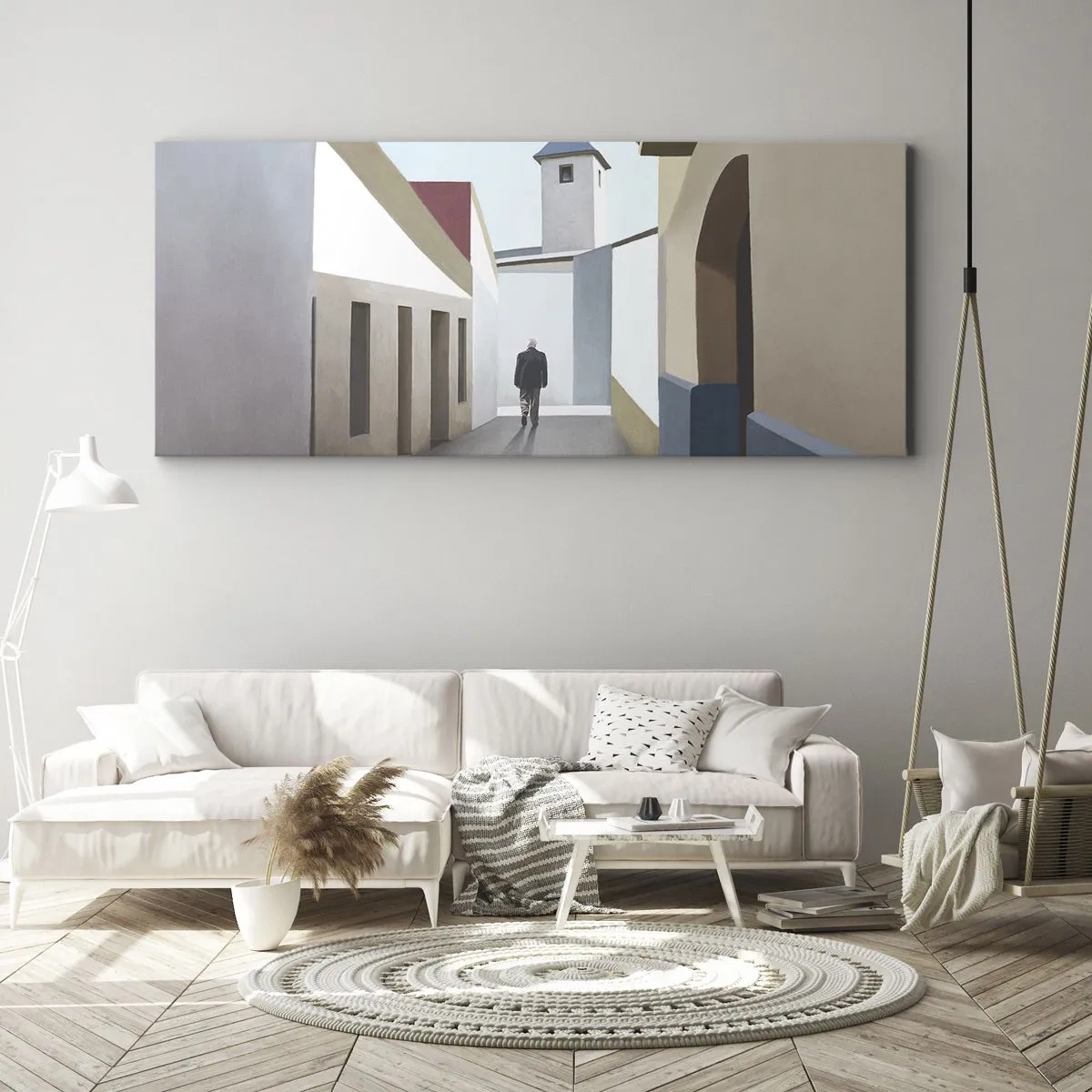 Obraz na płótnie - Minimalistyczna uliczka z sylwetką mężczyzny w tle - 140x50cm - Słoneczny spacer - Nowoczesna dekoracja ścienna do salonu i sypialni ARTTOR