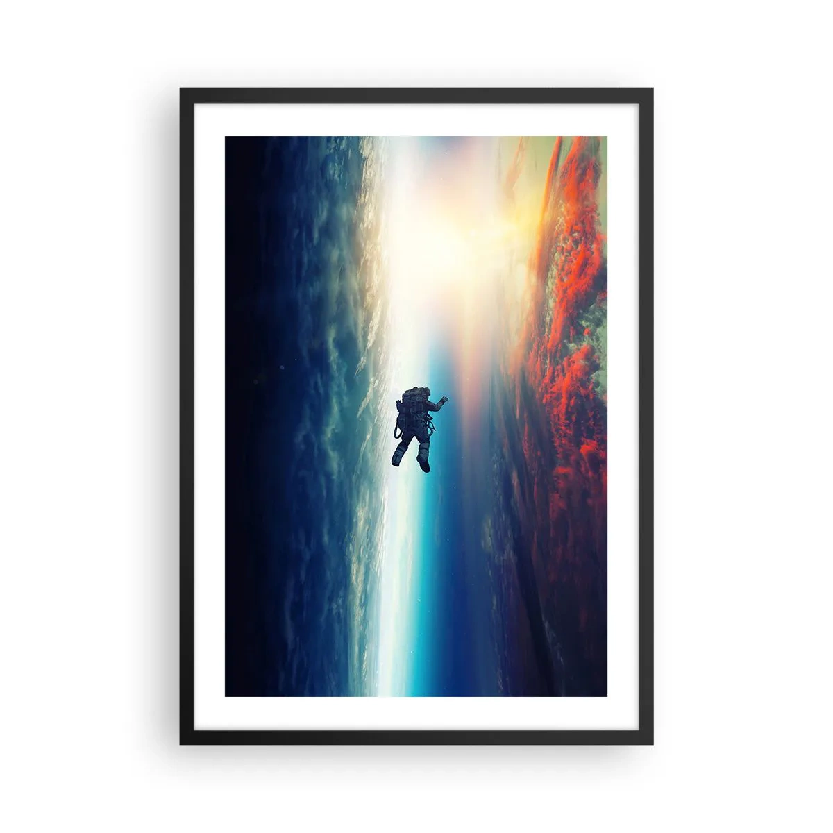 Plakat w czarnej ramie - Mierzyć się ze wszechświatem - Astronauta w przestrzeni kosmicznej na tle Ziemi i słońca - 50x70cm