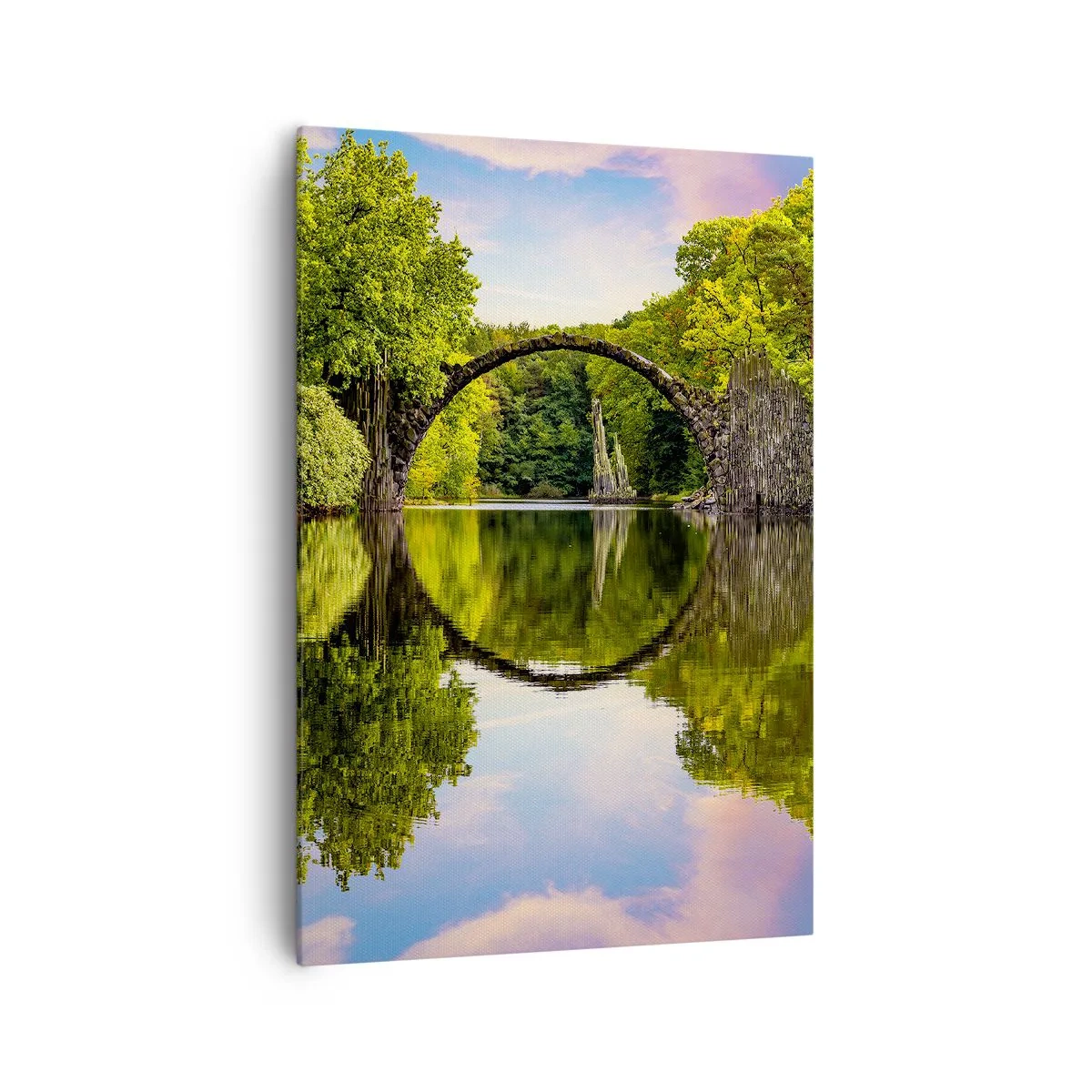 Obraz na płótnie - Kamienny most nad rzeką z perfekcyjnym odbiciem w wodzie - 70x100cm - Na styku dwóch światów - Nowoczesna dekoracja ścienna do salonu i sypialni ARTTOR