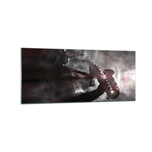 Obraz na szkle - Saksofonista w dymie na scenie w klimatycznej czerni i czerwieni - 120x50cm - W oparach jazzu - Nowoczesna dekoracja ścienna do salonu i sypialni ARTTOR