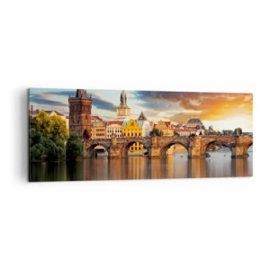 Obraz na płótnie - Zabytkowy most nad rzeką w świetle zachodzącego słońca - 140x50cm - Piękna od wieków - Nowoczesna dekoracja ścienna do salonu i sypialni ARTTOR