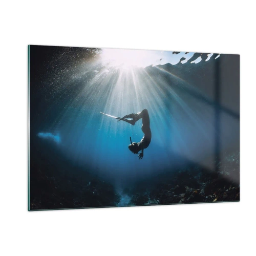 Obraz na szkle - Nurek w ruchu pod wodą w promieniach światła - 120x80cm - Podwodny taniec - Nowoczesna dekoracja ścienna do salonu, kuchni i sypialni ARTTOR