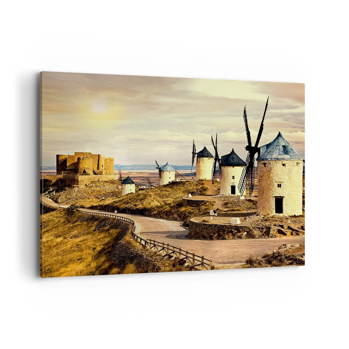 Obraz na płótnie - Wiatraki na wzgórzach z historycznym zamkiem w tle - 100x70cm - Zaraz pojawi się Don Kichot - Nowoczesna dekoracja ścienna do salonu, kuchni i sypialni ARTTOR