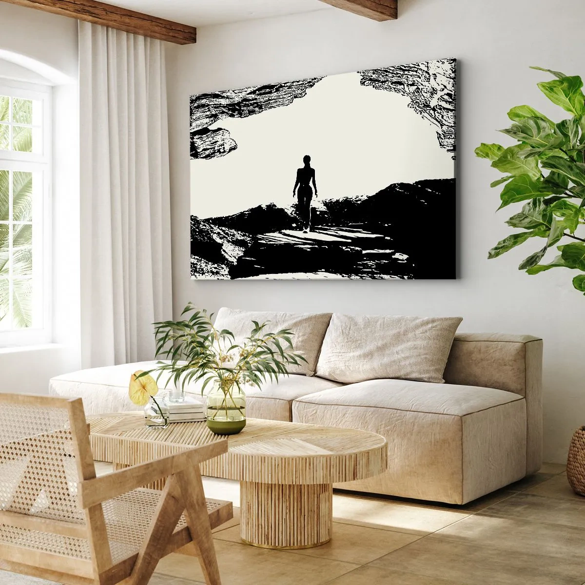 Obraz na płótnie - Czarno-biała sylwetka kobiety w jaskini na tle nieba - 70x50cm - Nowe spojrzenie - Nowoczesna dekoracja ścienna do salonu i sypialni ARTTOR