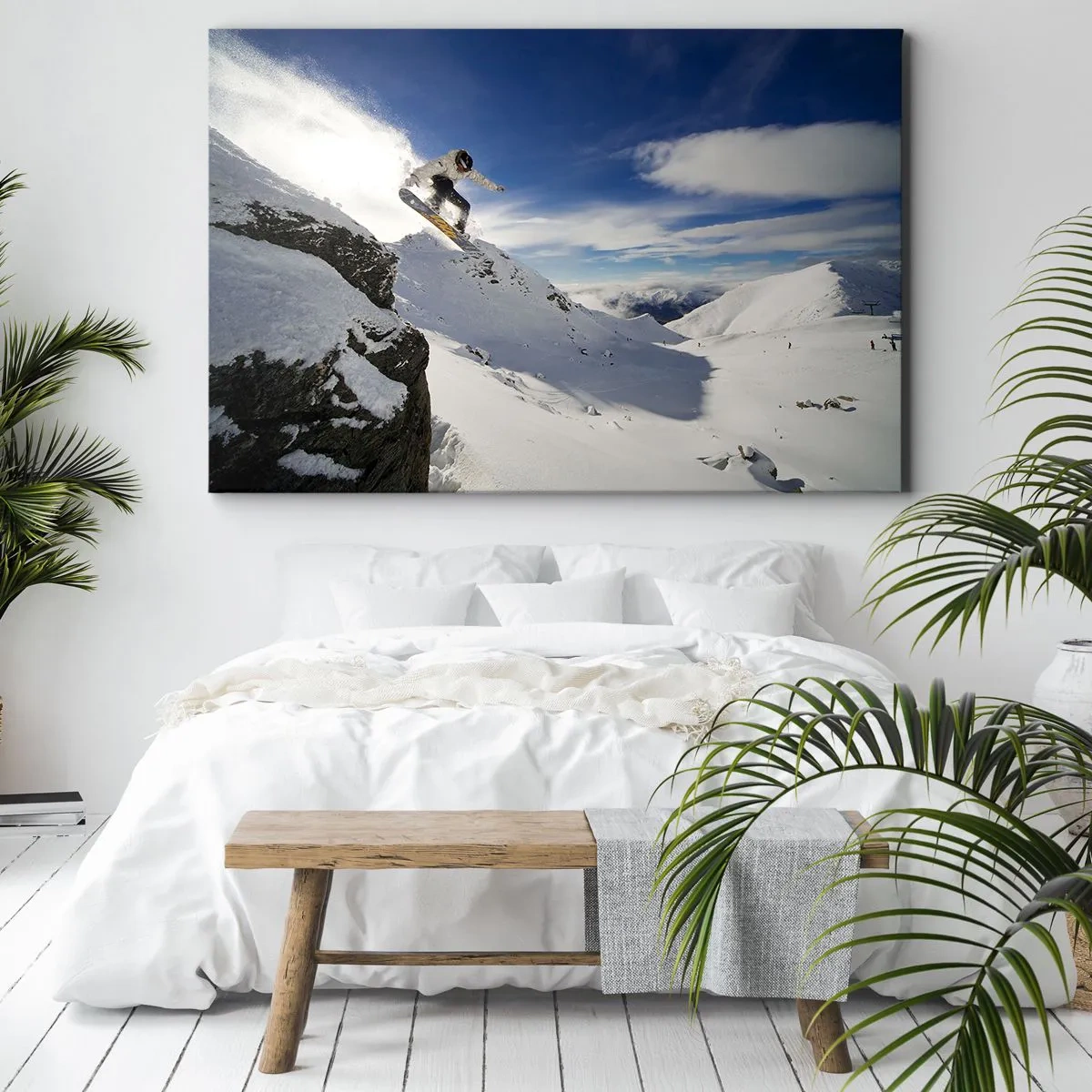 Obraz na płótnie - Snowboardzista skaczący z urwiska na tle ośnieżonych gór - 100x70cm - Wolność bez granic - Nowoczesna dekoracja ścienna do salonu, kuchni i sypialni ARTTOR