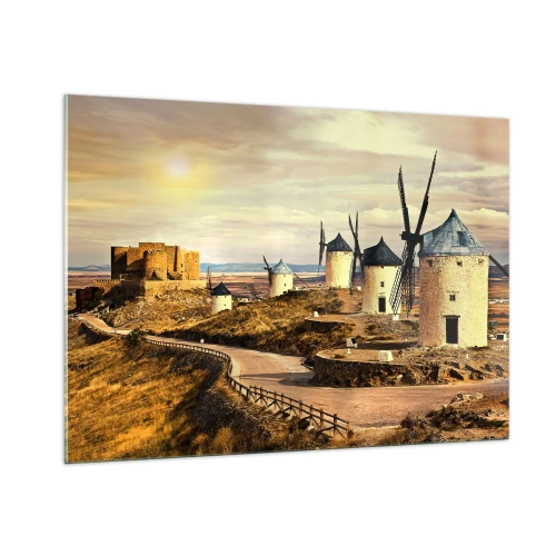 Obraz na szkle - Wiatraki i zamek w krajobrazie o zachodzie słońca - 100x70cm - Zaraz pojawi się Don Kichot - Nowoczesna dekoracja ścienna do salonu, kuchni i sypialni ARTTOR