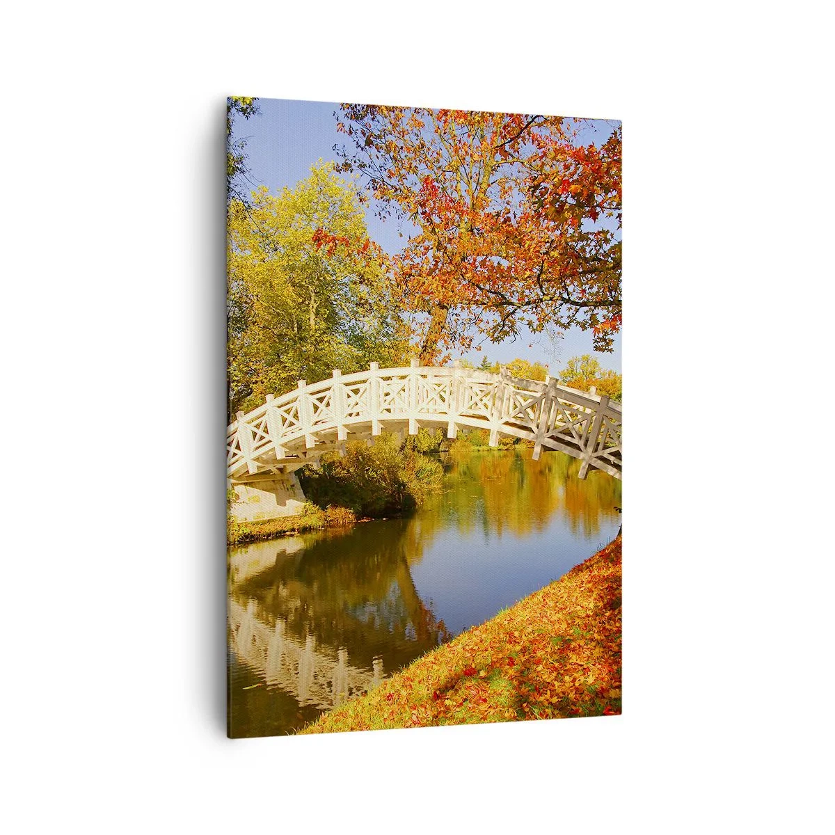 Obraz na płótnie - Mostek w parku otoczony jesiennymi liśćmi nad spokojną wodą - 70x100cm - Na białym mostku westchnień - Nowoczesna dekoracja ścienna do salonu i sypialni ARTTOR